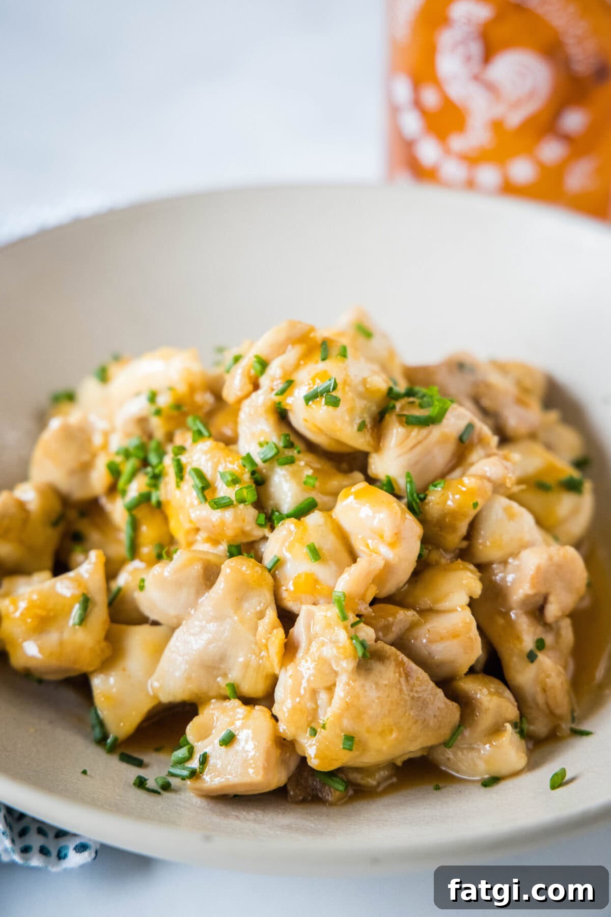 Crispy Honey Sriracha Chicken Bites 6 honey sriracha chicken bites in a serving bowl