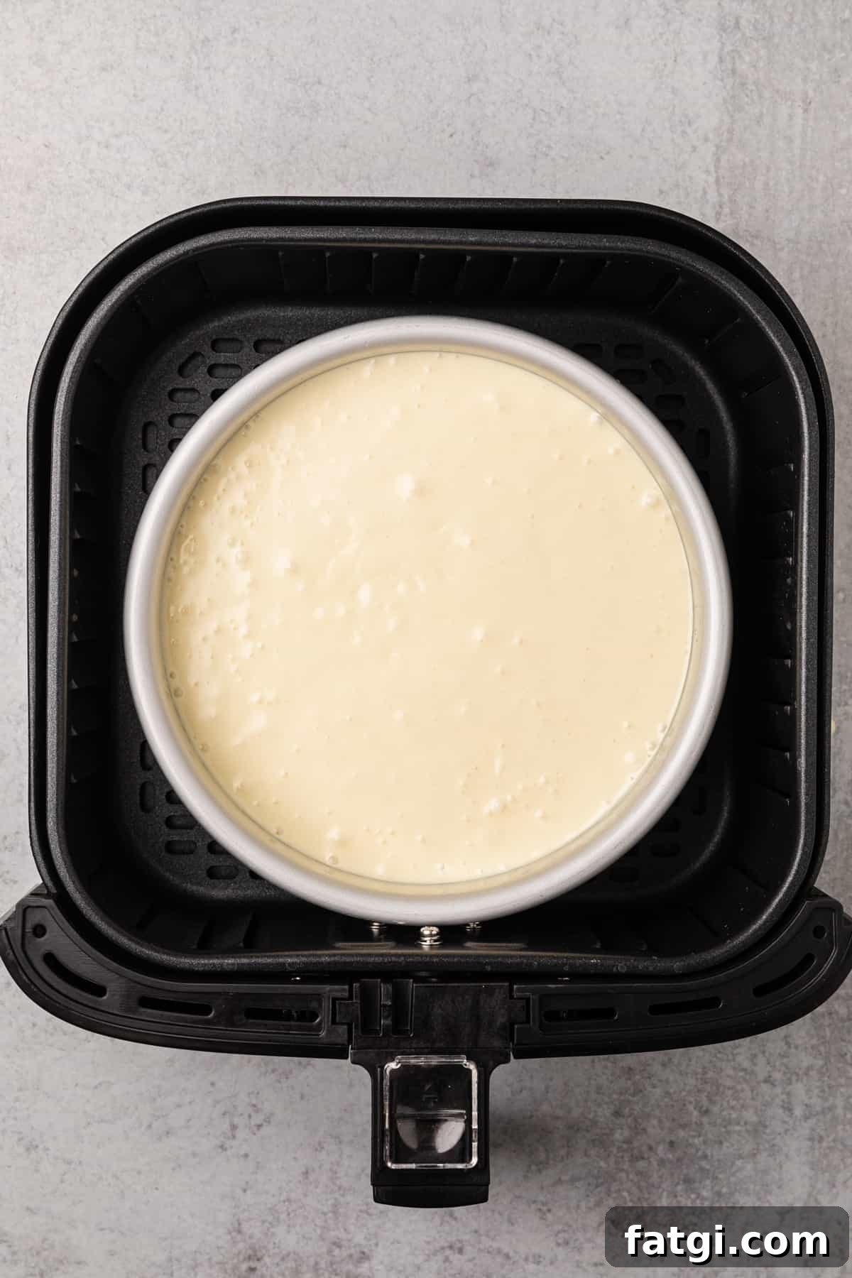 pan of batter in an air fryer basket