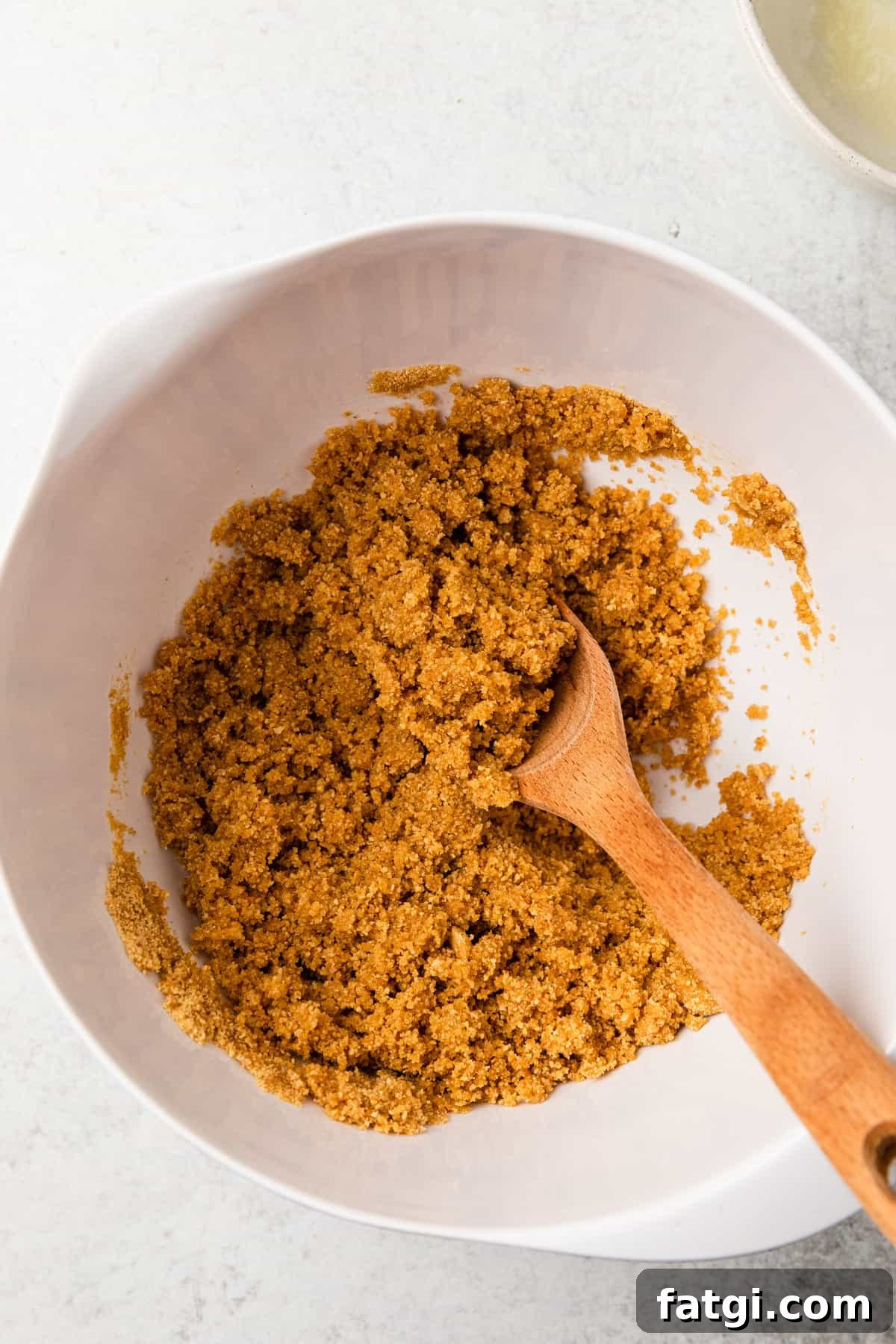 mix graham cracker crumbs with butter