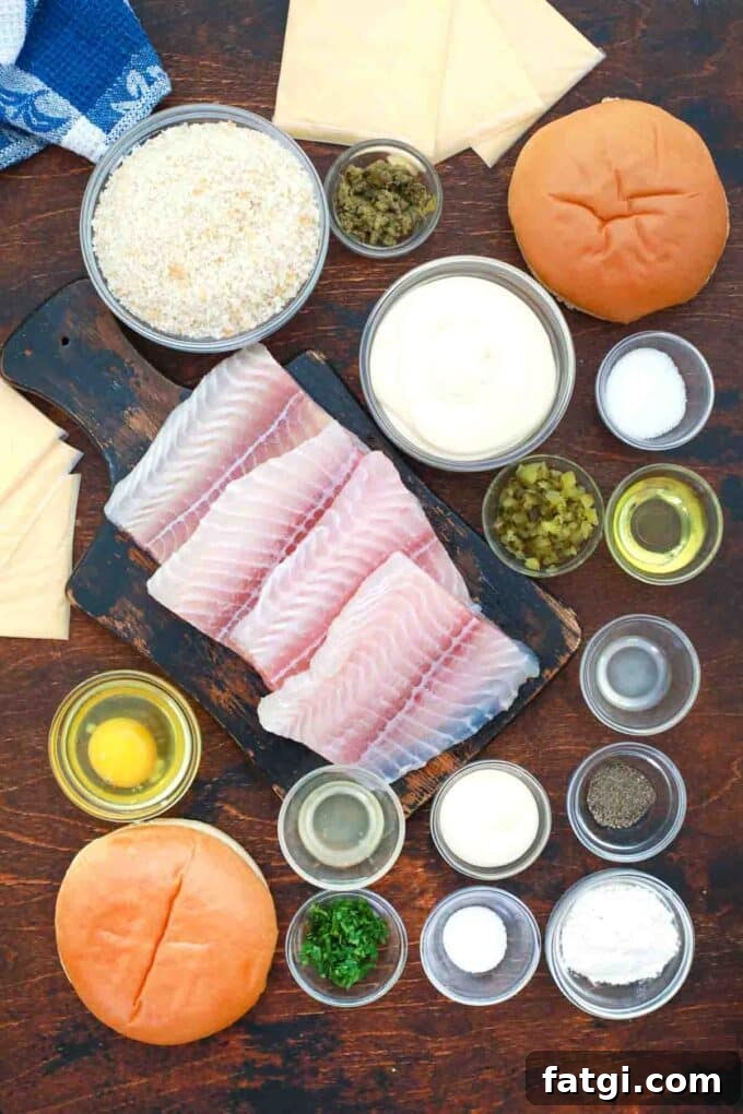 Copycat McDonald's Filet-O-Fish Sandwich Recipe 3 overhead shot of fish fillets panko eggs sauces and spices in bowls on a table