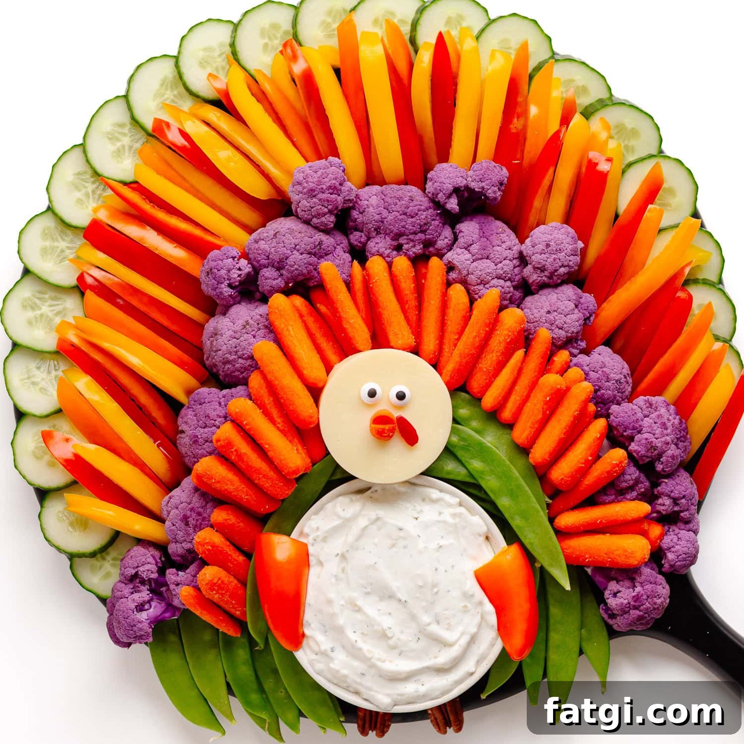 A Thanksgiving veggie tray arranged in the shape of a turkey.