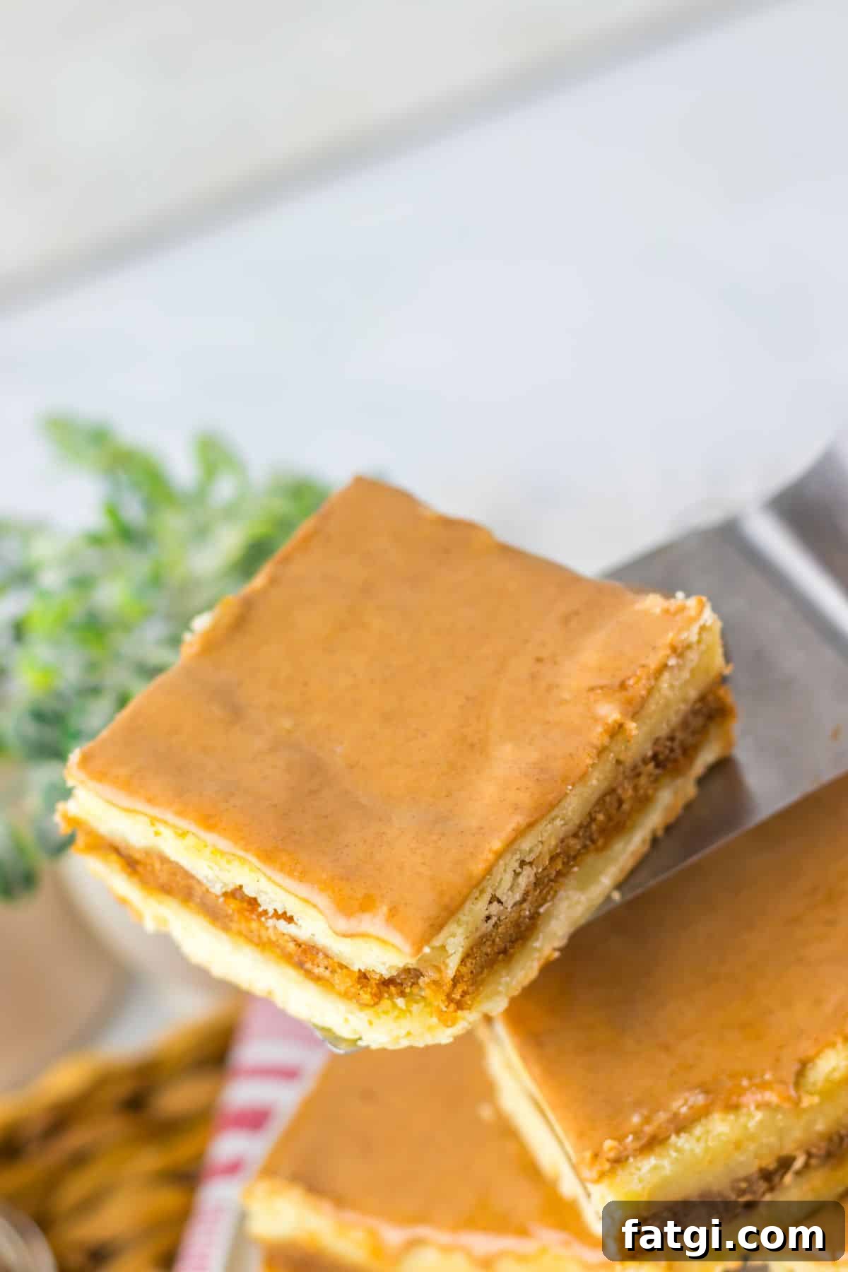 Brown butter cinnamon bar on a spatula.