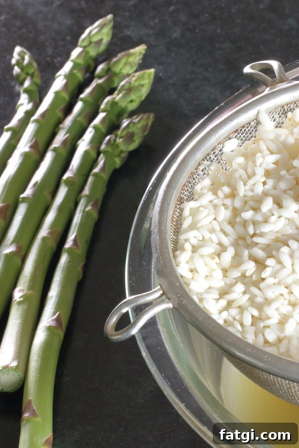 Creamy Vegan Asparagus Risotto Recipe with Garlic and Lemon 3 Five spears of fresh asparagus; a fine mesh strainer of arborio rice that's draining into a bowl
