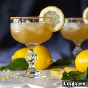 Lemon Crush Cocktail with a coconut sugar rim and lemon garnish