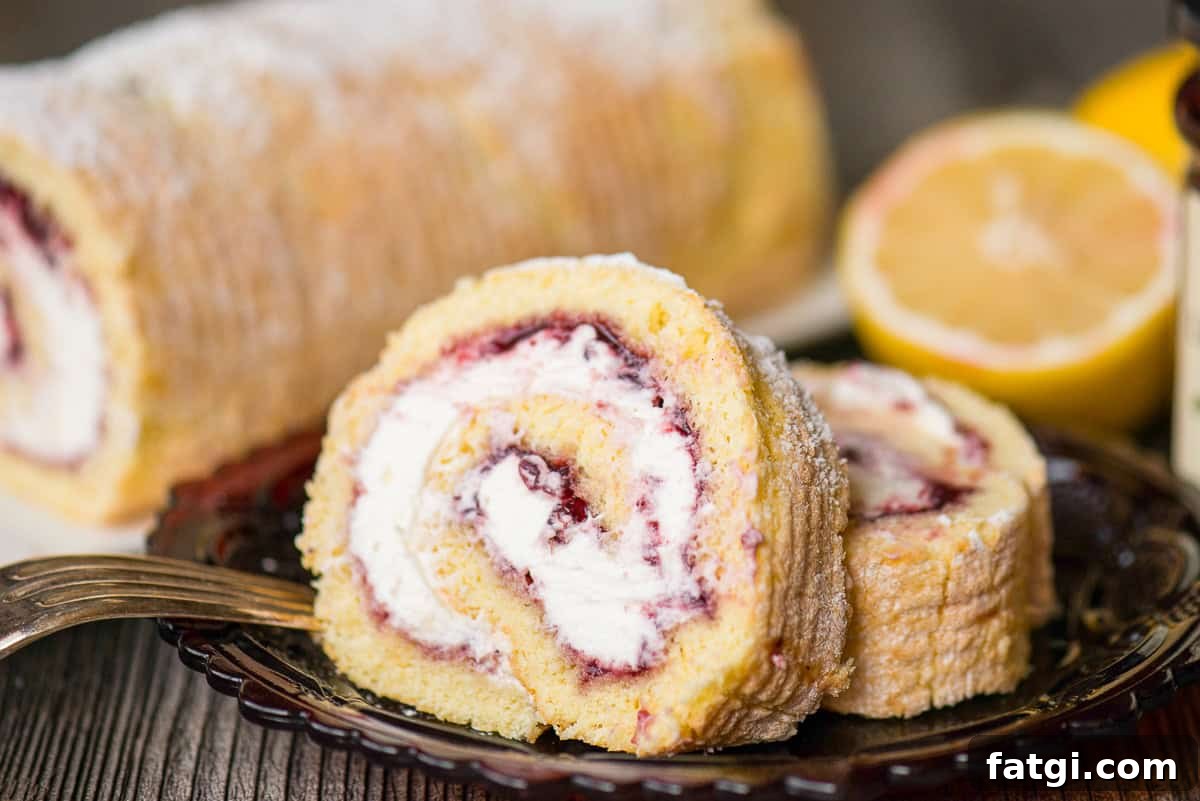 slices of lemon berry cake roll with cream filling.