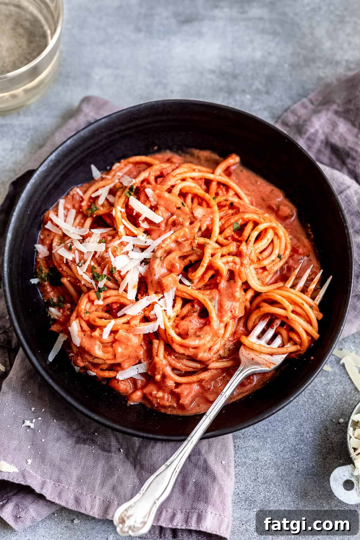 Rose pasta sauce- Pink sauce in a bowl with a fork.