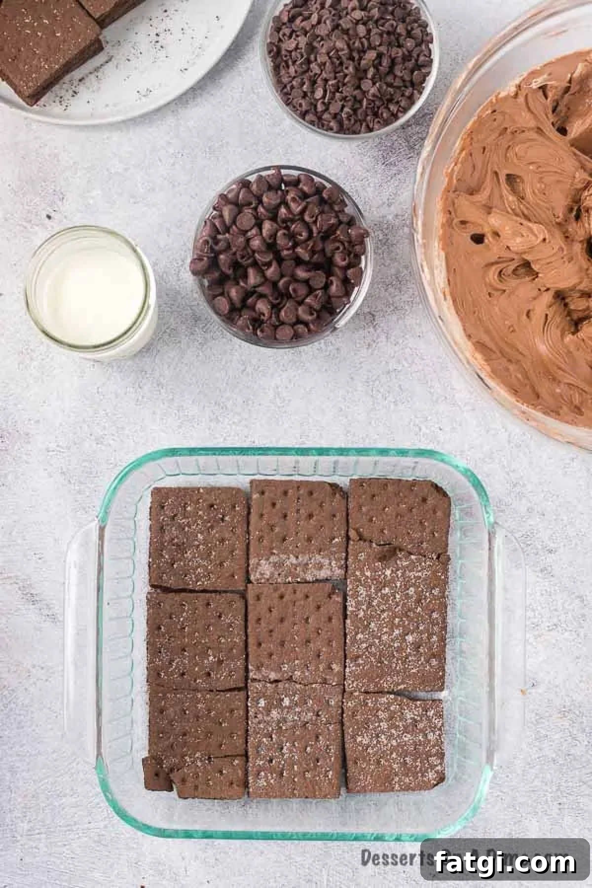 Graham crackers layered in dish. 