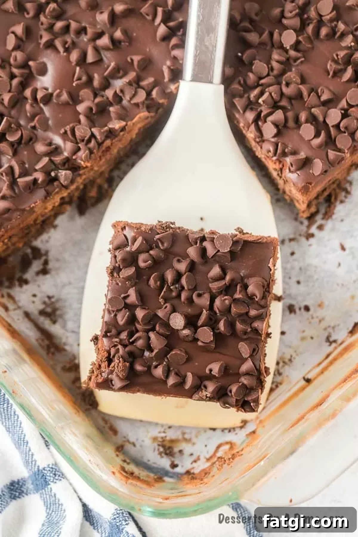 Chocolate icebox cake being served. 