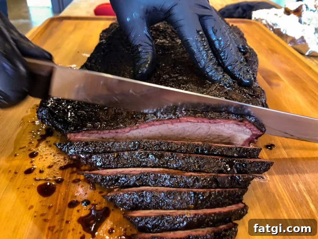 smoked brisket being sliced
