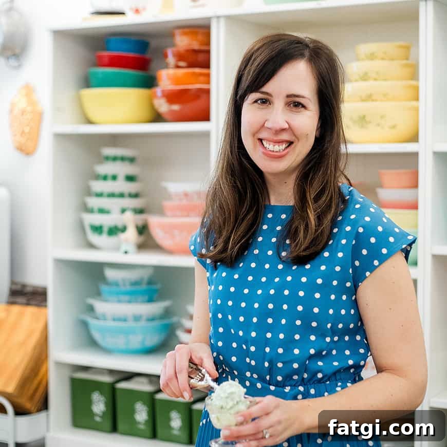 Homemade Cheese Log Recipe 3 woman scooping pistachio salad into a parfait dish, with colorful vintage bowls in the background.