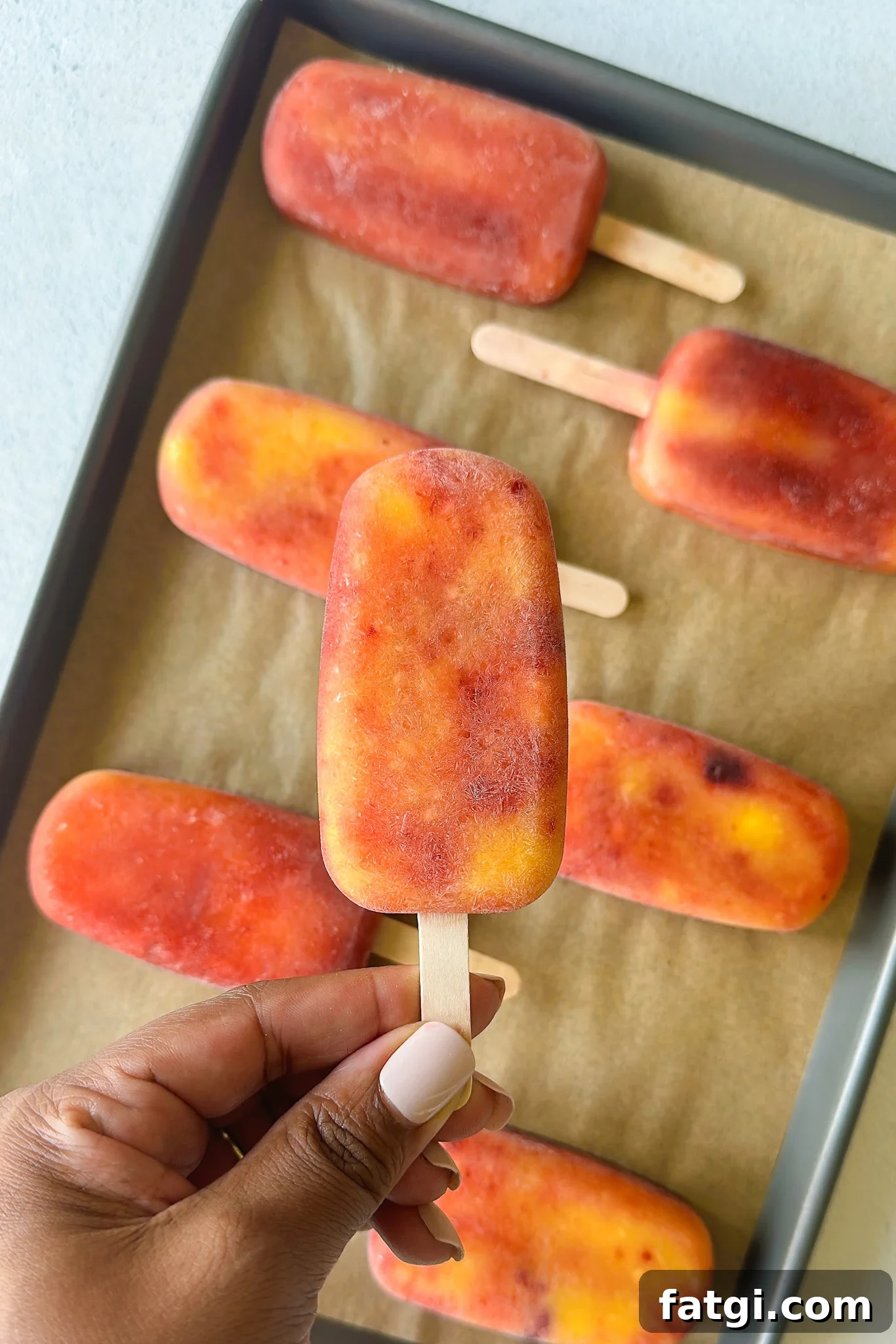 Mango Cherry Popsicles Recipe: Refreshing Homemade Treat 6 Mango cherry popsicles.