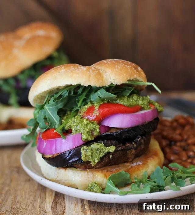 Grilled Portobello Burger Recipe with Balsamic Glaze 2 The Ultimate Grilled Portobello Burger with grilled eggplant, roasted red peppers, red onion, arugula, and pesto sauce