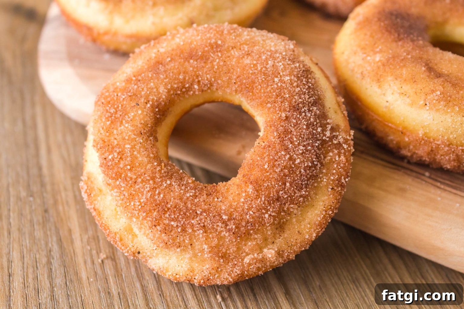 Close-up of one sourdough donut on a counter.