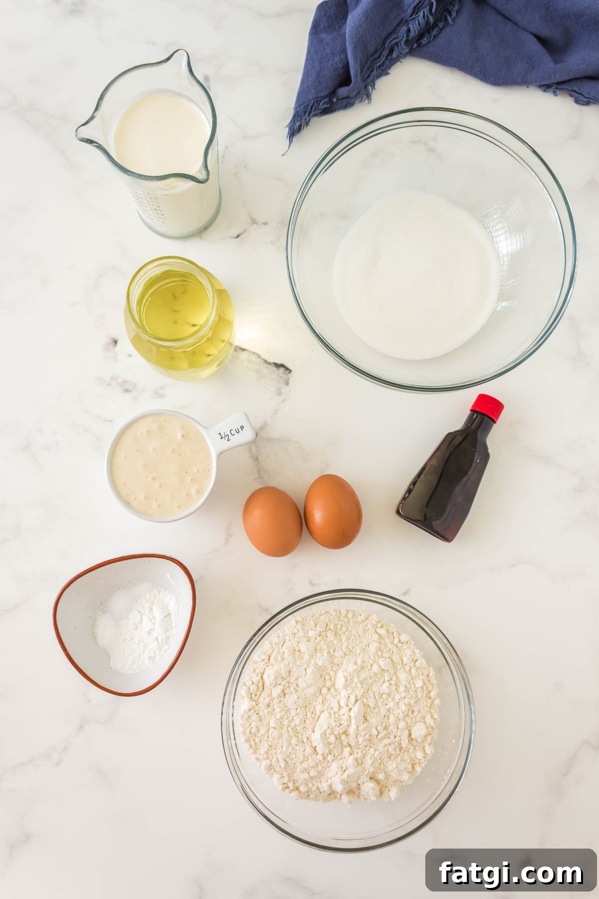 ingredients: flour, sugar, oil, sourdough discard, eggs, vanilla, milk, baking soda, baking powder, salt.