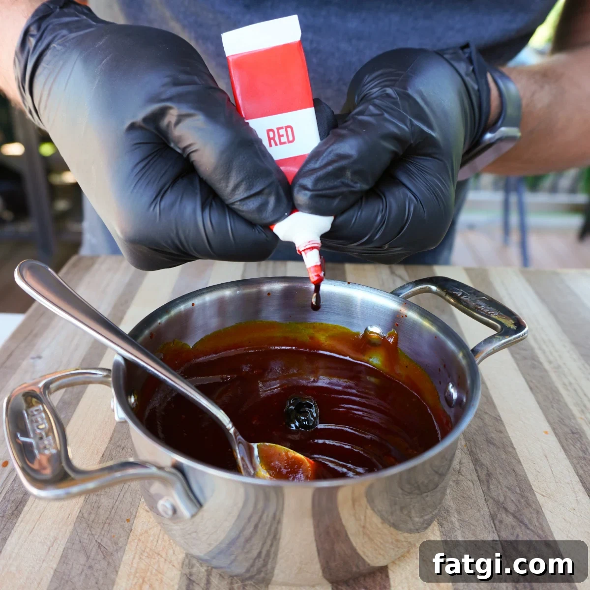Bloody BBQ sauce in a pan