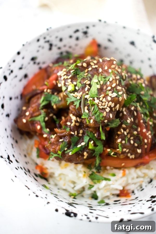 Sweet and Sour Pork Kou Lou Yuk Recipe 4 Sweet and Sour Pork Kou Lou Yuk gu lou yok or 咕噜肉 in a bowl with rice