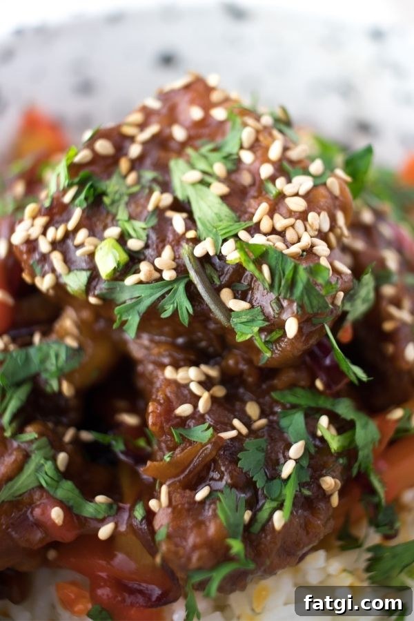 Sweet and Sour Pork Kou Lou Yuk Recipe 5 Close up of sweet and sour pork on rice