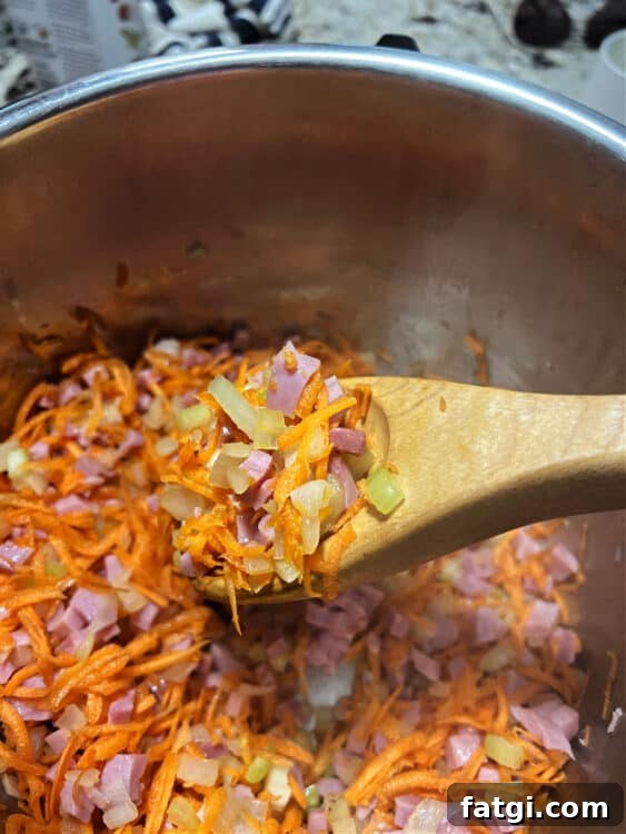 Instant Pot Navy Bean and Smoked Ham Soup 4 saute vegetables with ham