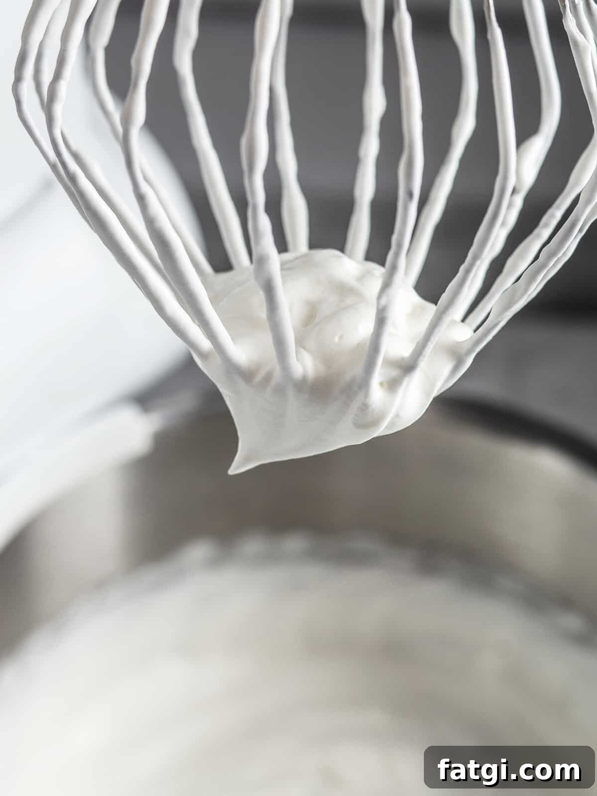 French Chantilly Cream Recipe 5 Chantilly cream with a medium peak over the bowl