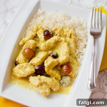 Turkey Curry on a white plate with rice
