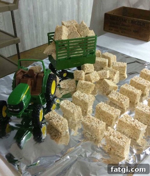 Tractor carrying rice krispie treats. Cute idea! 