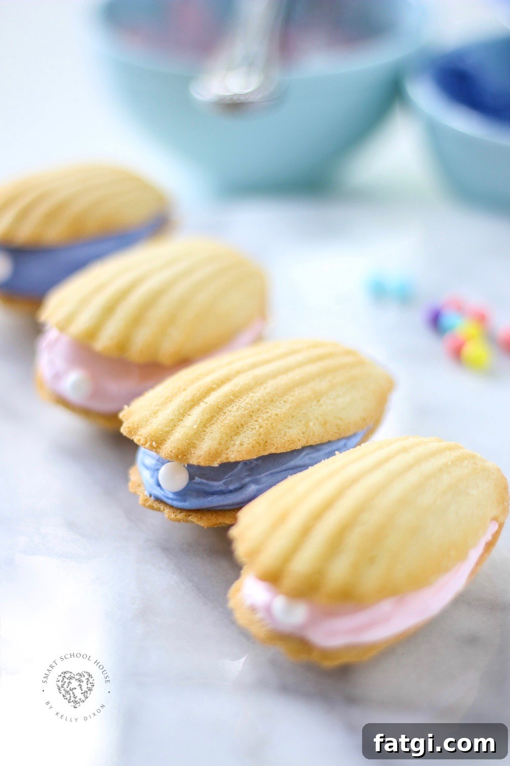 Seashell Pearl Cookies - for a beach theme party or mermaid party. Also fun for a quick and easy dessert using Madeline cookies. #UnderTheSea #MermaidParty #BeachTheme #SeashellCookies