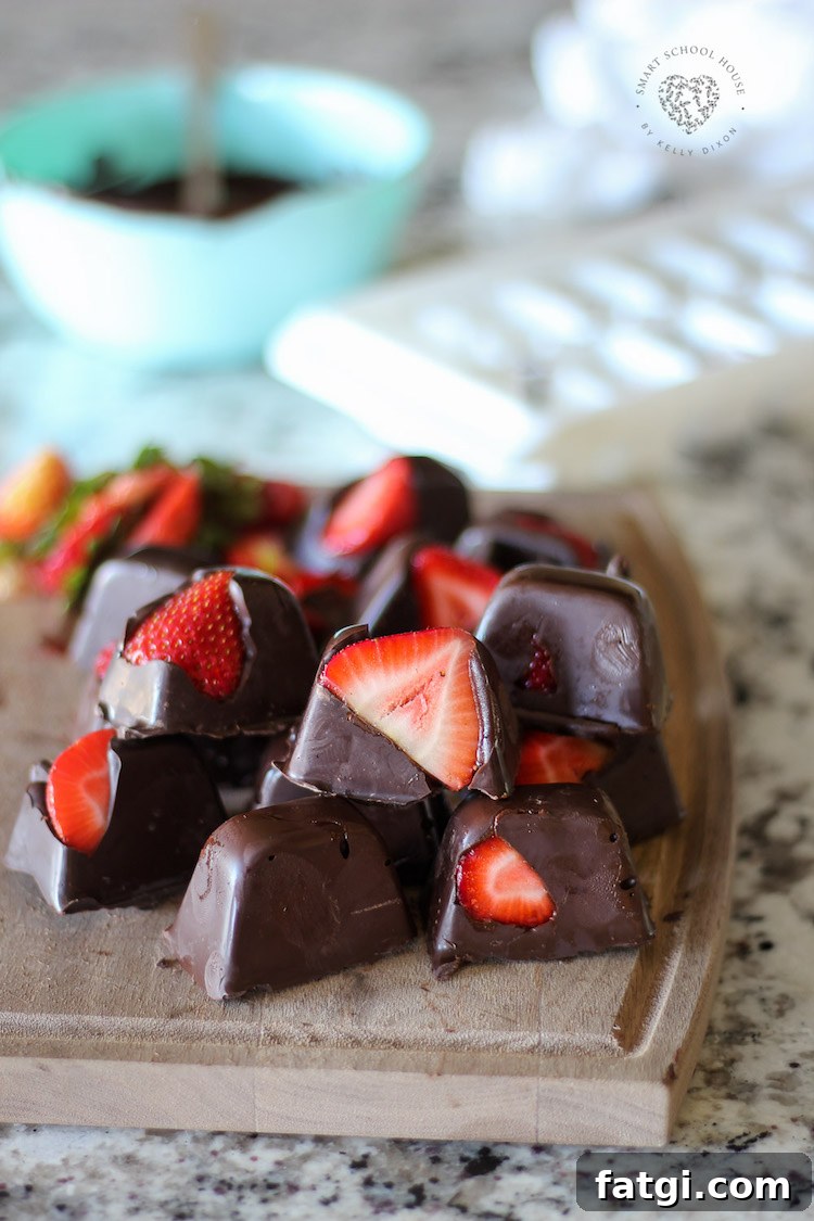Chocolate Covered Strawberries in an Ice Cube Tray - These cost less than $5 to make! Perfect for entertaining or a night in.