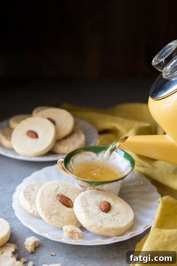 Almond Shortbread Cookies on a plate with tea