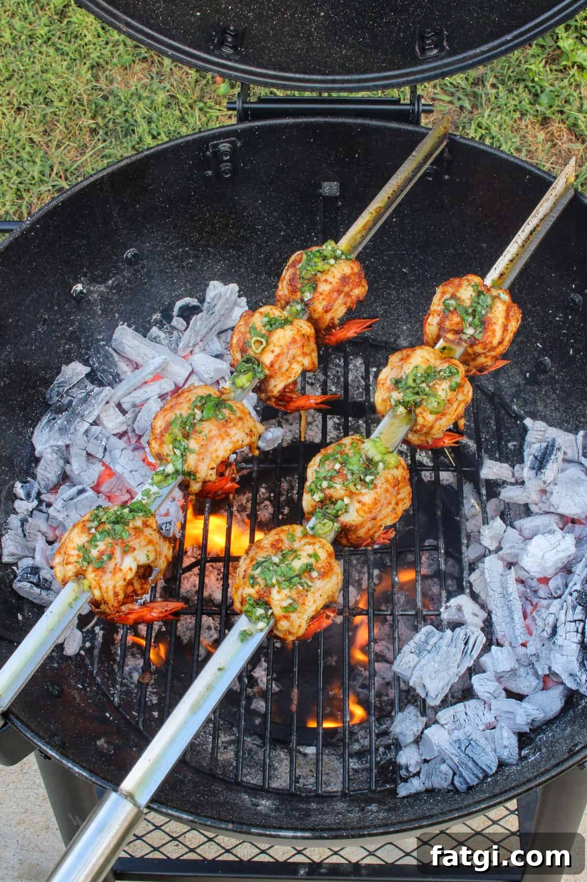 The seasoned lobster is skewered and grilled to perfection. 