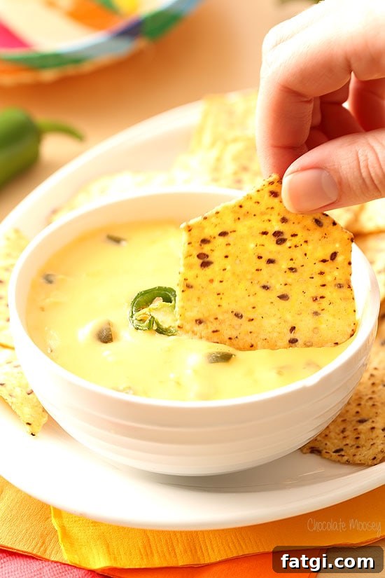 Dipping into Nacho Cheese Dip