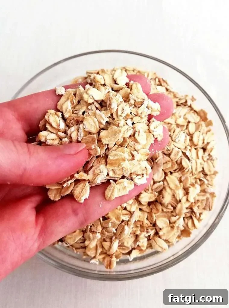 oatmeal cookies rolled oats in hand