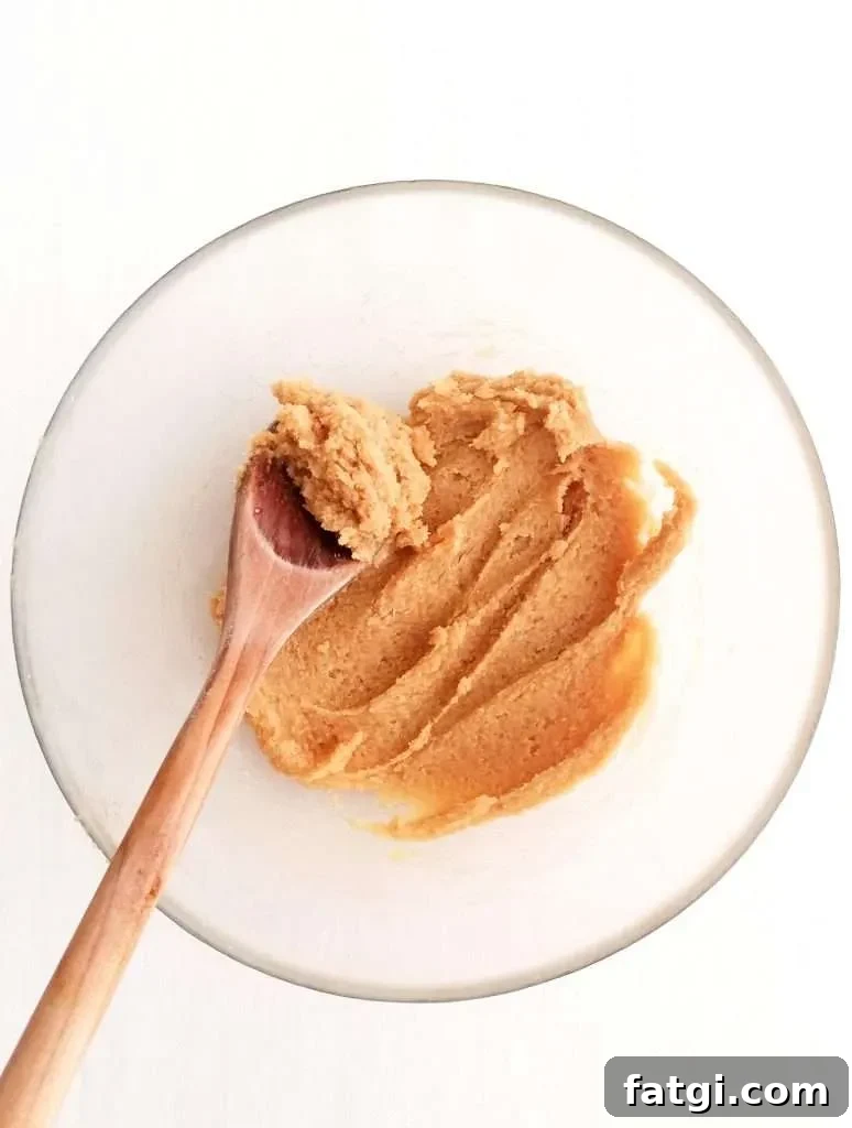 oatmeal cookies butter and sugars creamed together in bowl