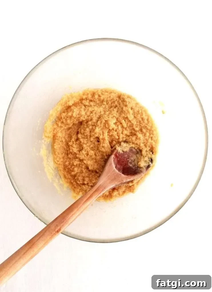 oatmeal cookies egg and vanilla whisked into butter mix