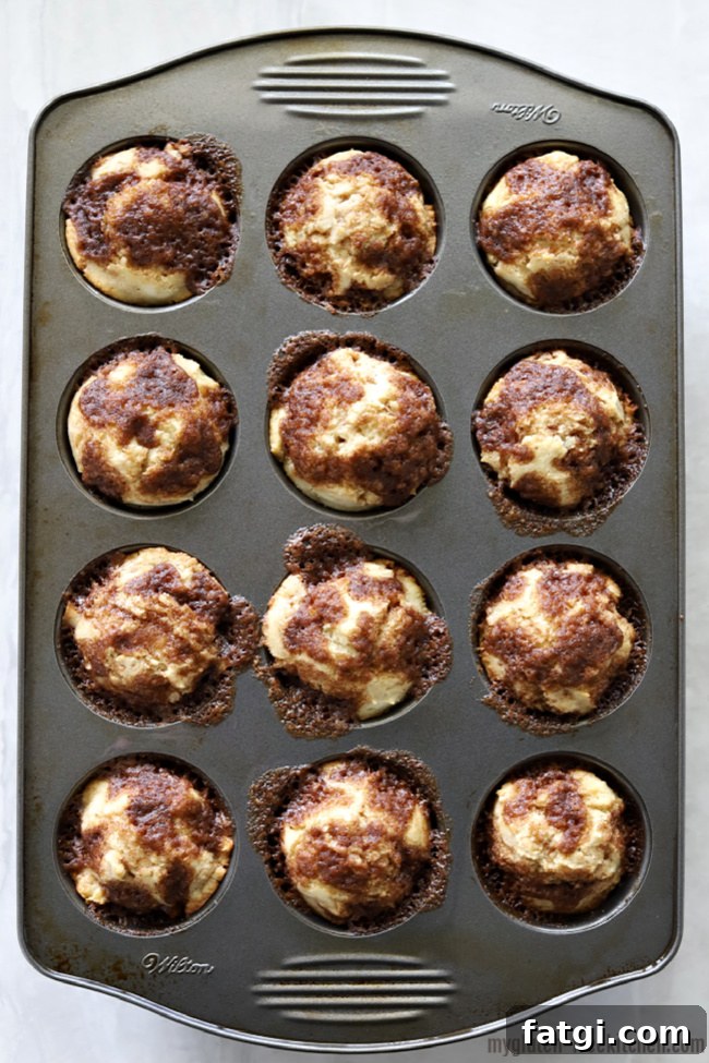 Muffin pan full of gluten-free cinnamon muffins