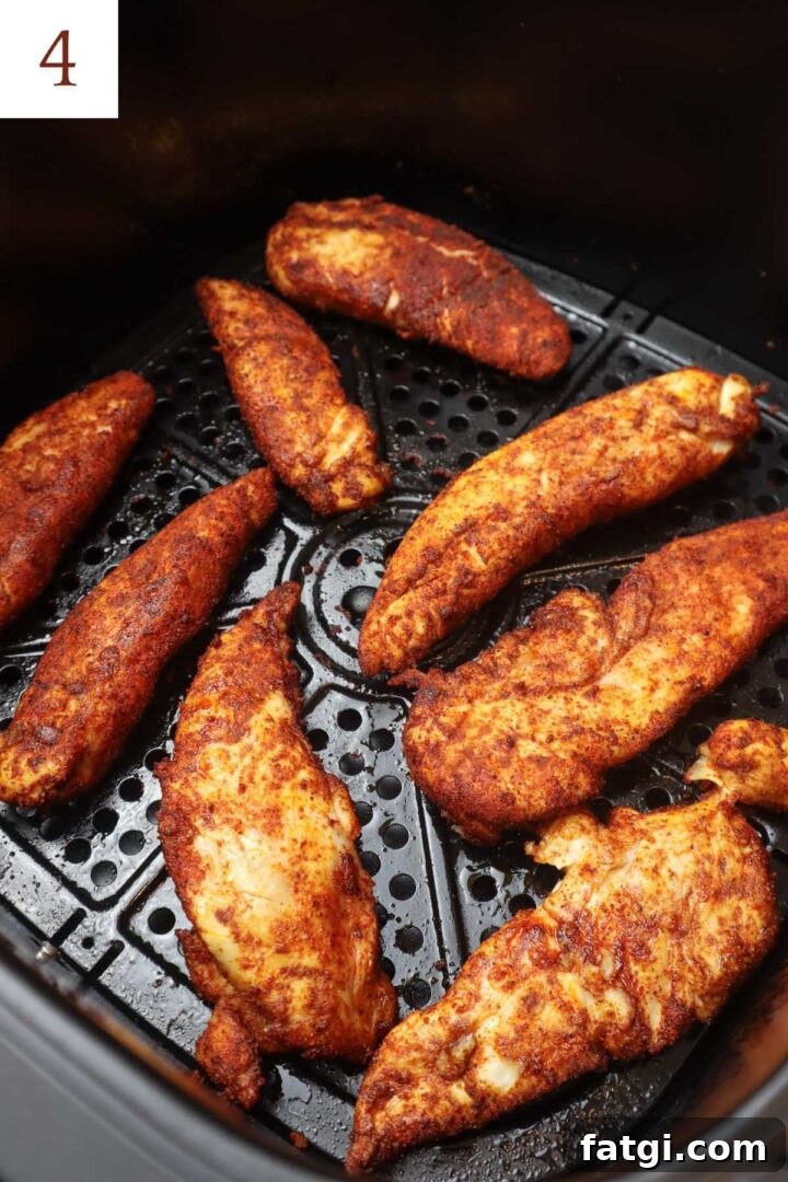fully cooked blackened chicken tenders in air fryer.