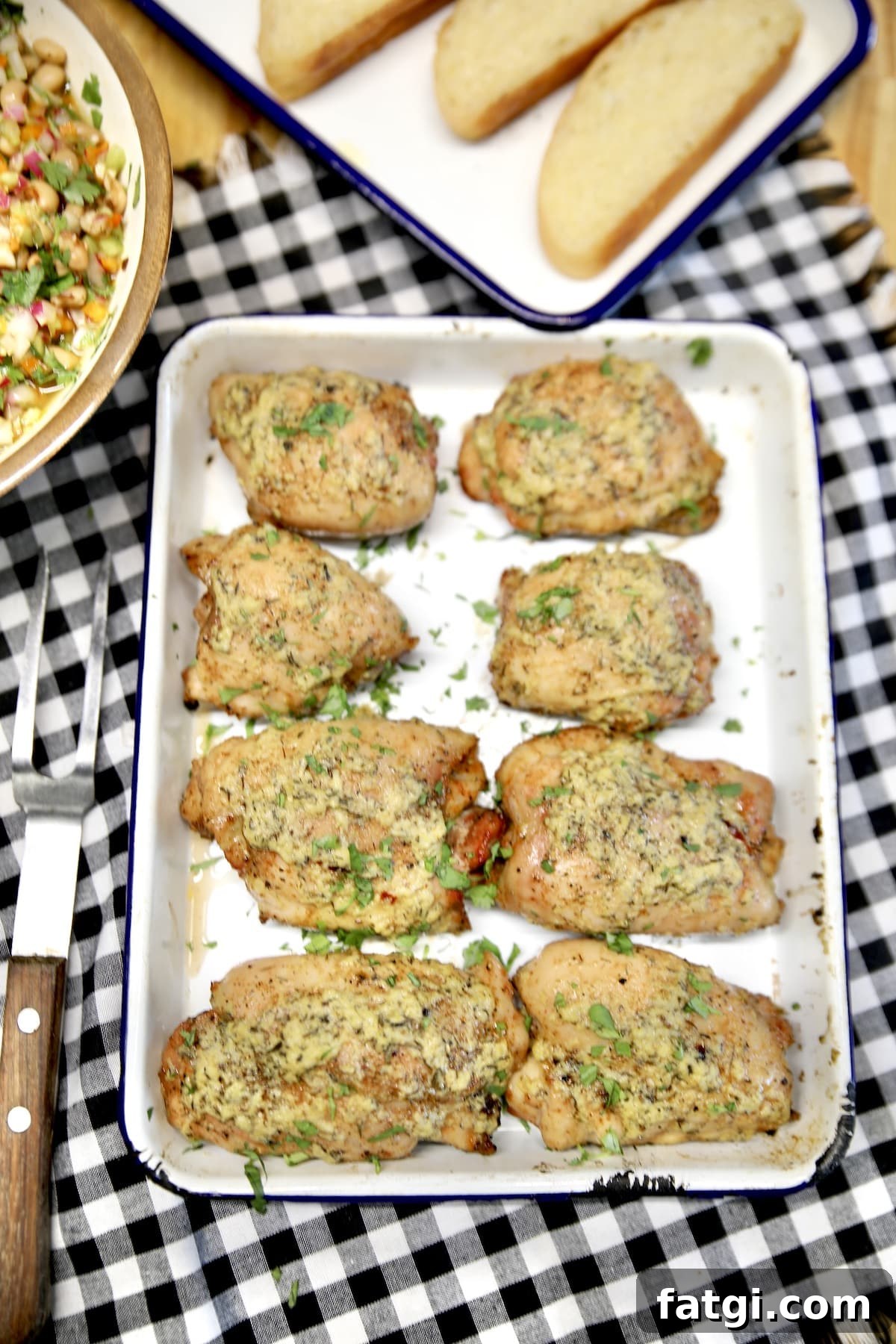 Cowboy butter chicken thighs on a platter.