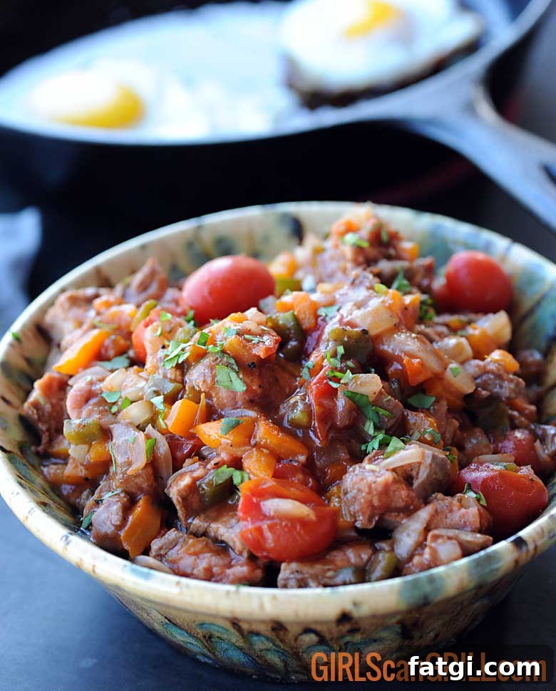 bowl of beef chunks with grilled veggies