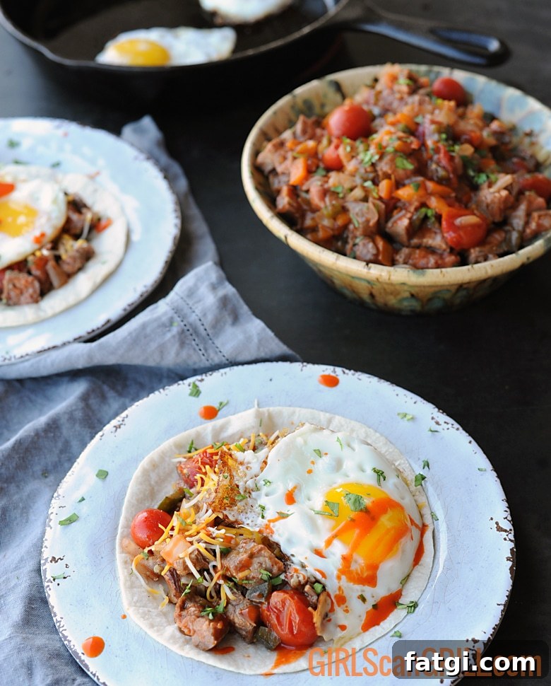 white plate with tortilla, beef, salsa and egg