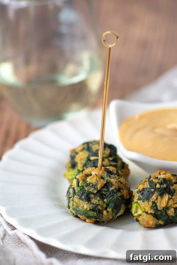 a gold toothpick going into a spinach ball