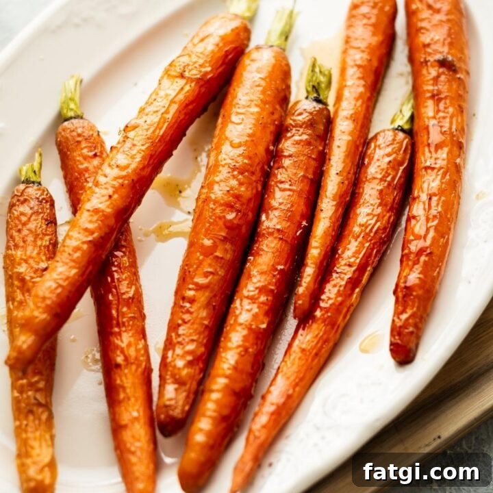 candied carrots on a white plate