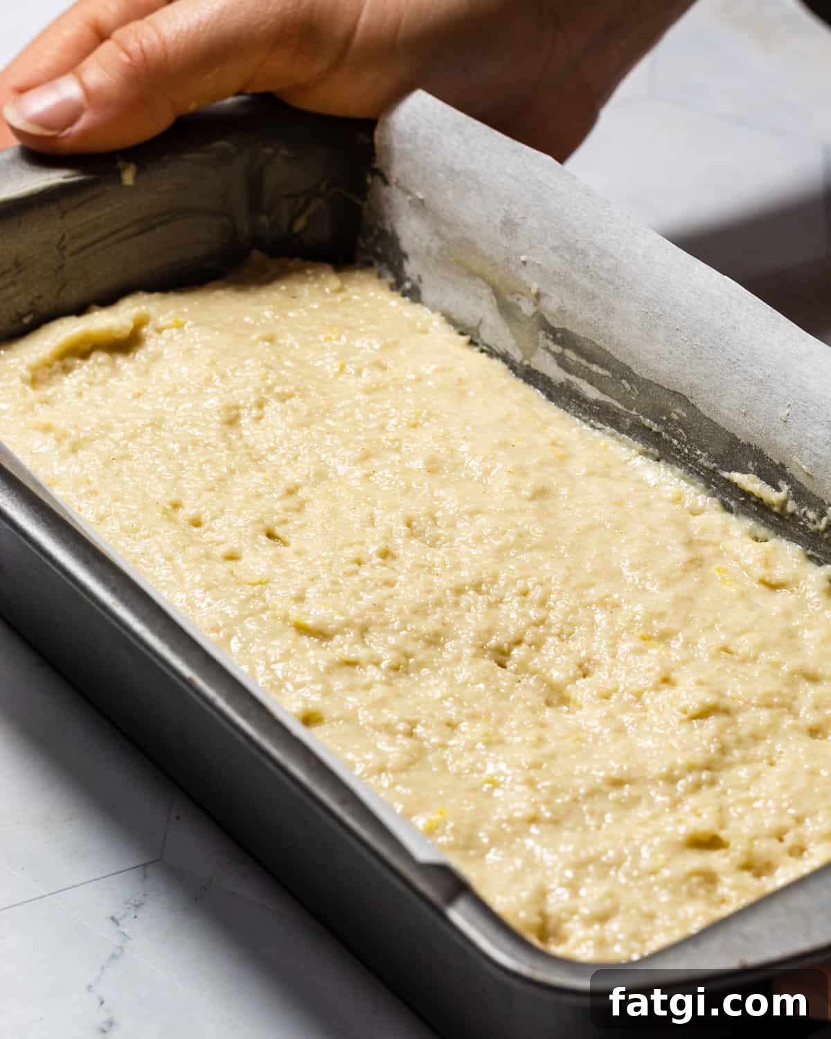 Gluten-Free Lemon Drizzle Loaf Cake Recipe 6 Gluten-free Lemon Drizzle Cake batter in a loaf tin ready to be baked.