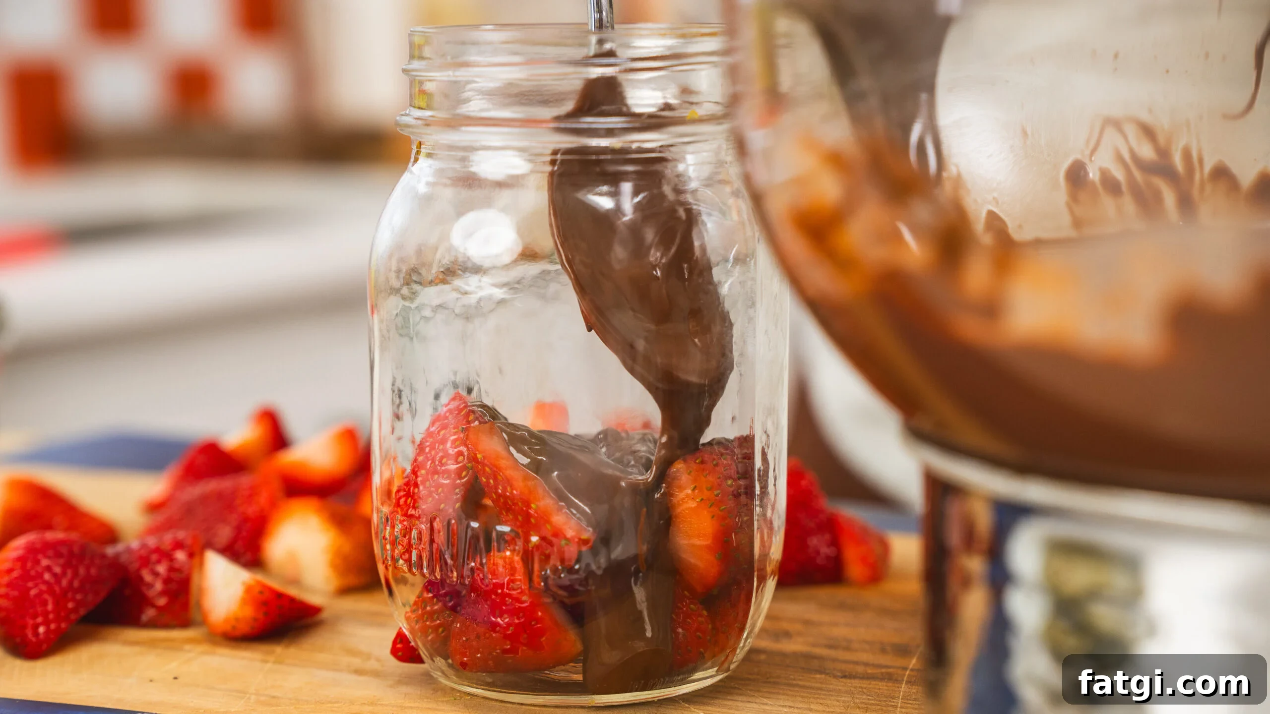 Dubai Chocolate Strawberries layered in a mason jar.