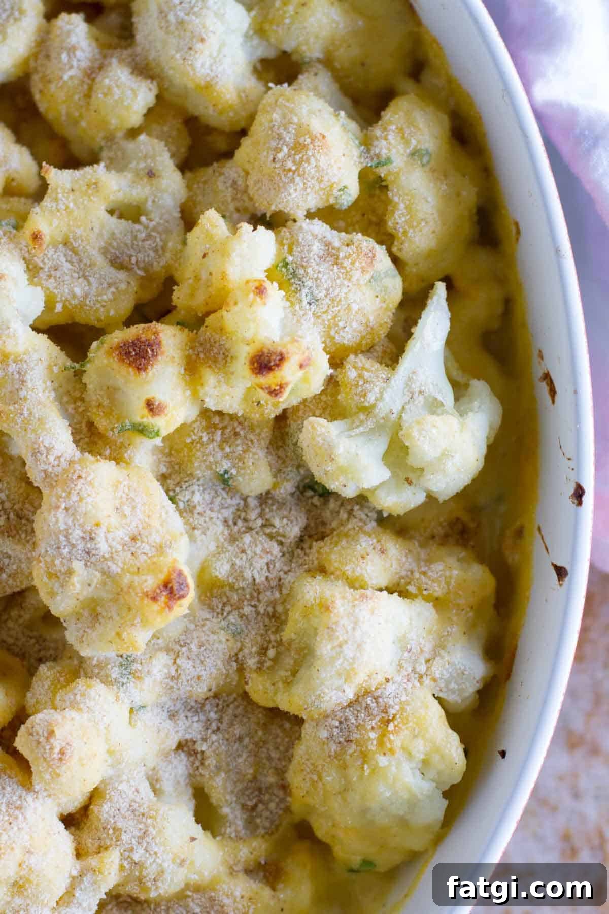 Baking dish full of Cheddar Cauliflower Gratin.