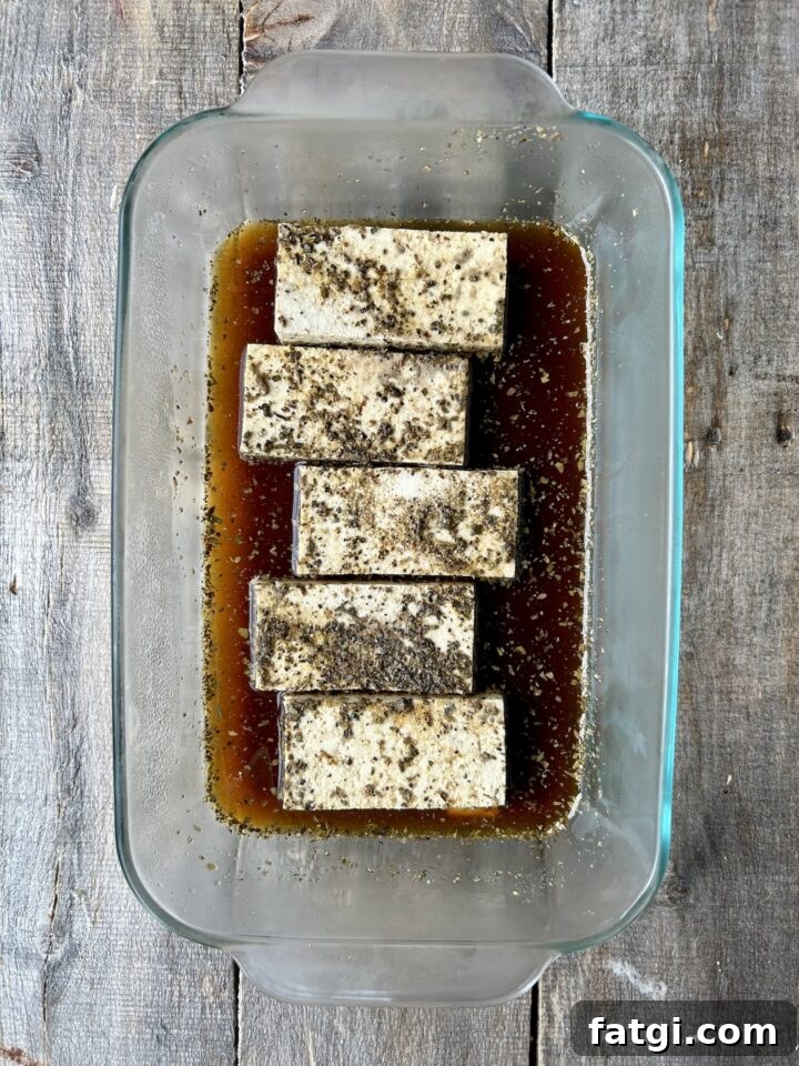 Pressed tofu slices ready for marinade