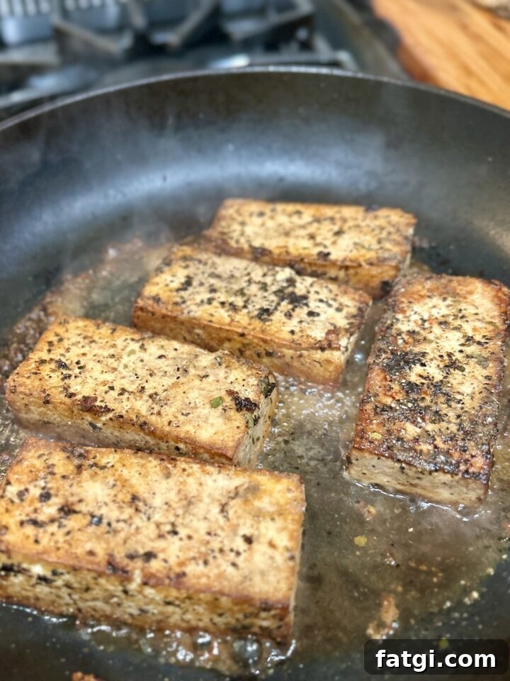 Marinated tofu planks in a dish