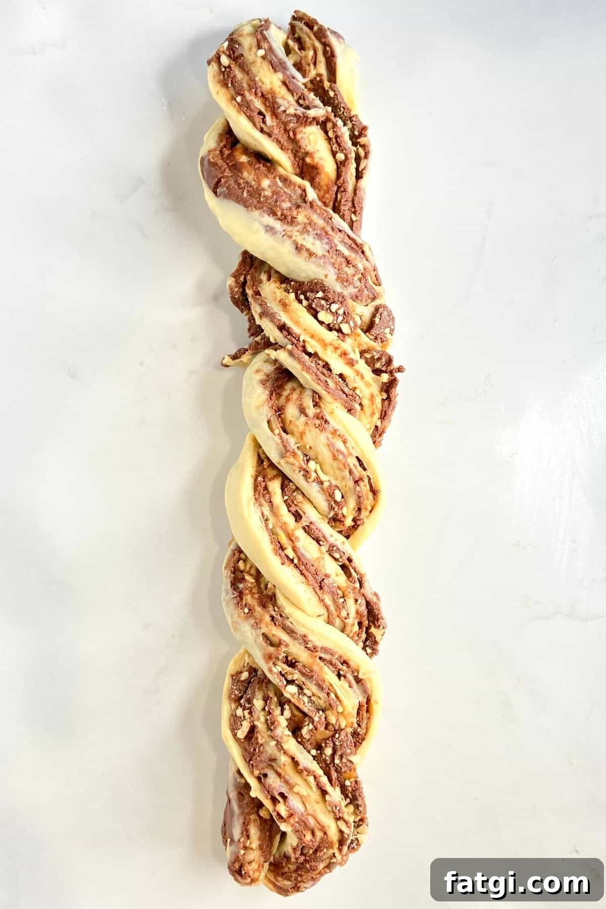 Two pieces of dough twisted together.