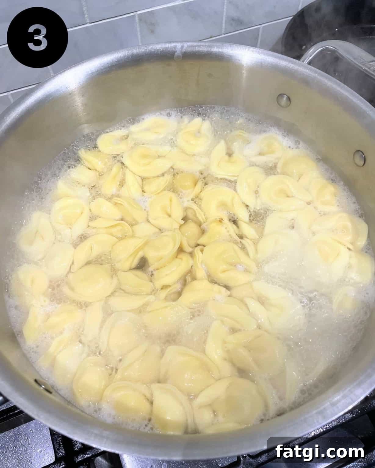 tortelloni pasta in a large pot of salted water.