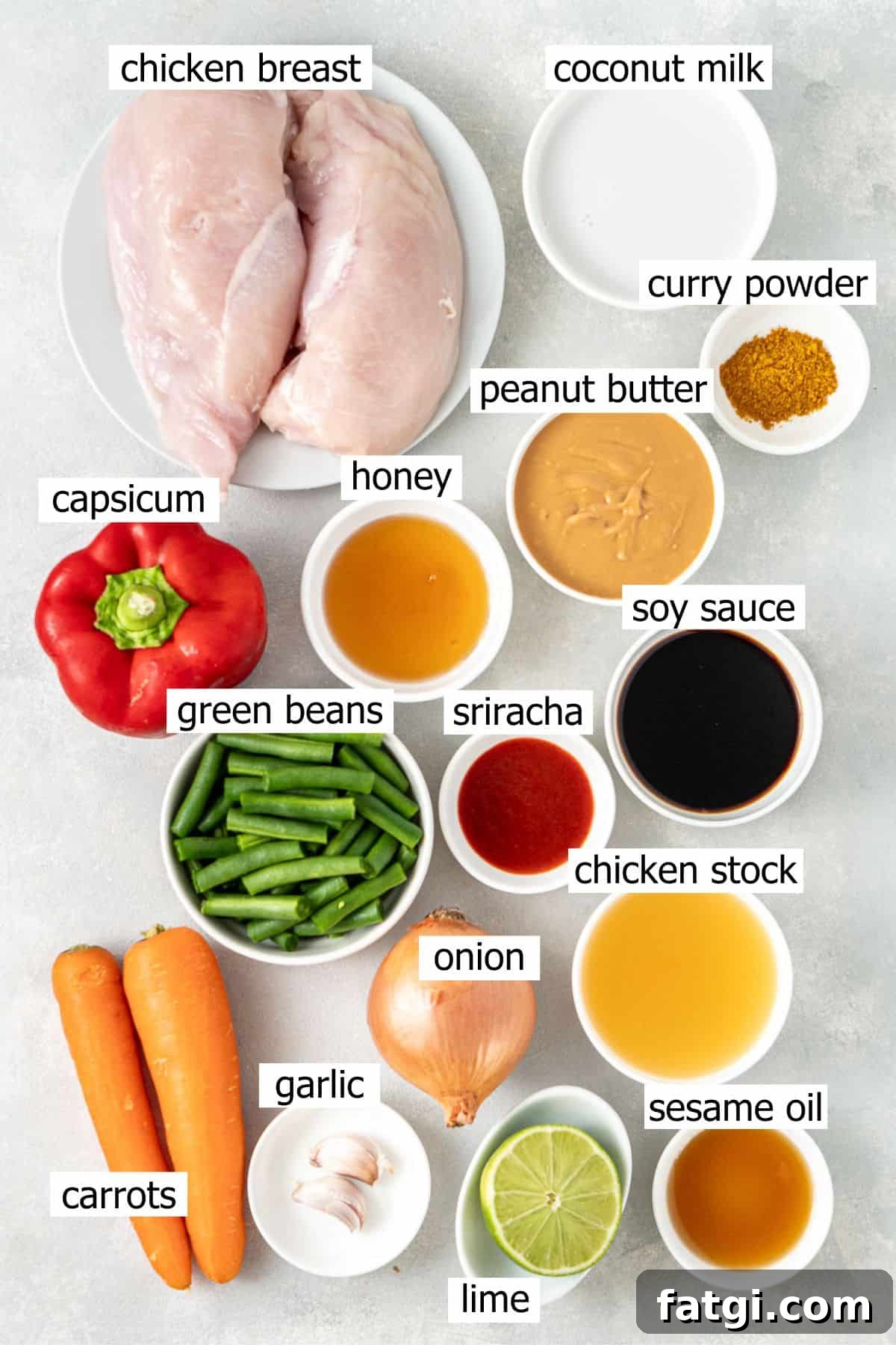 All ingredients needed to make slow cooker satay chicken laid out in small bowls.