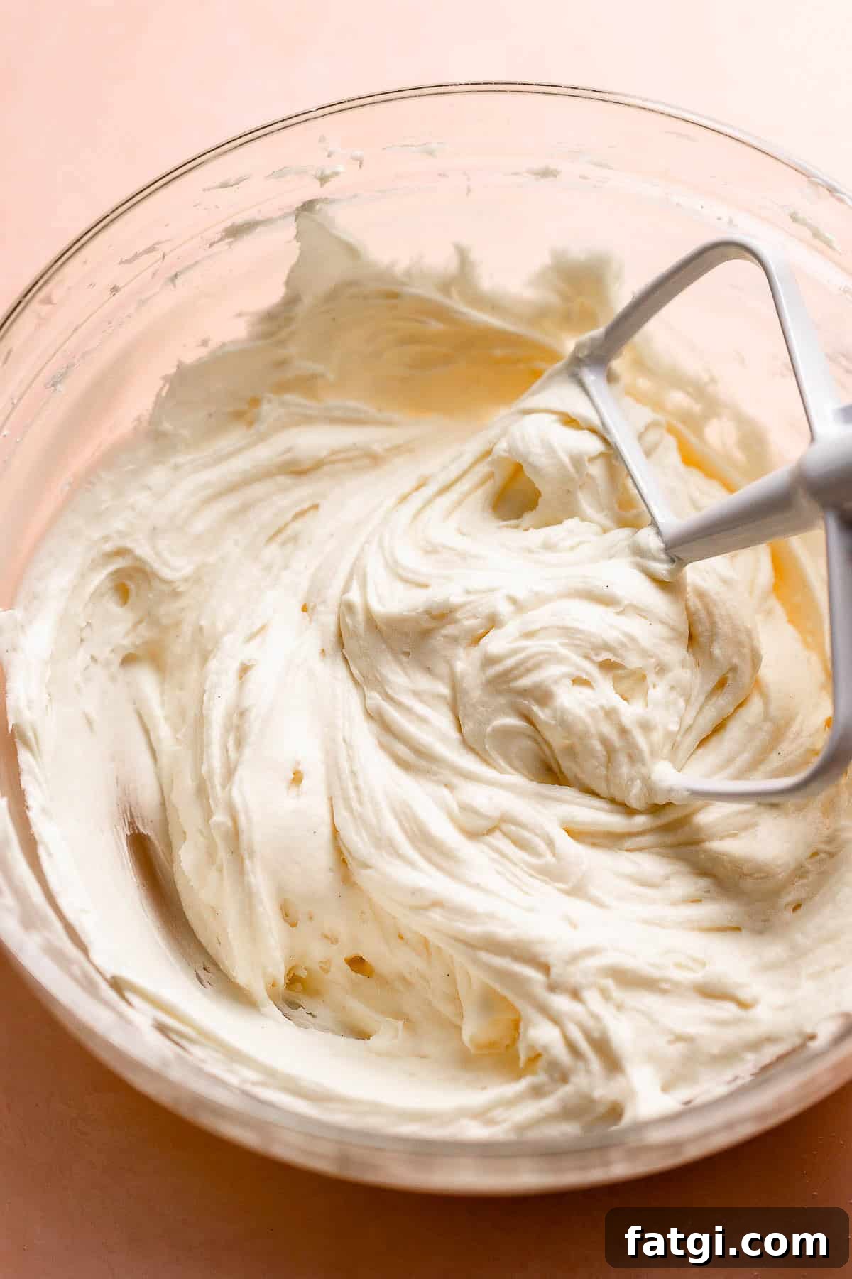 Lemon cream cheese frosting in a bowl.