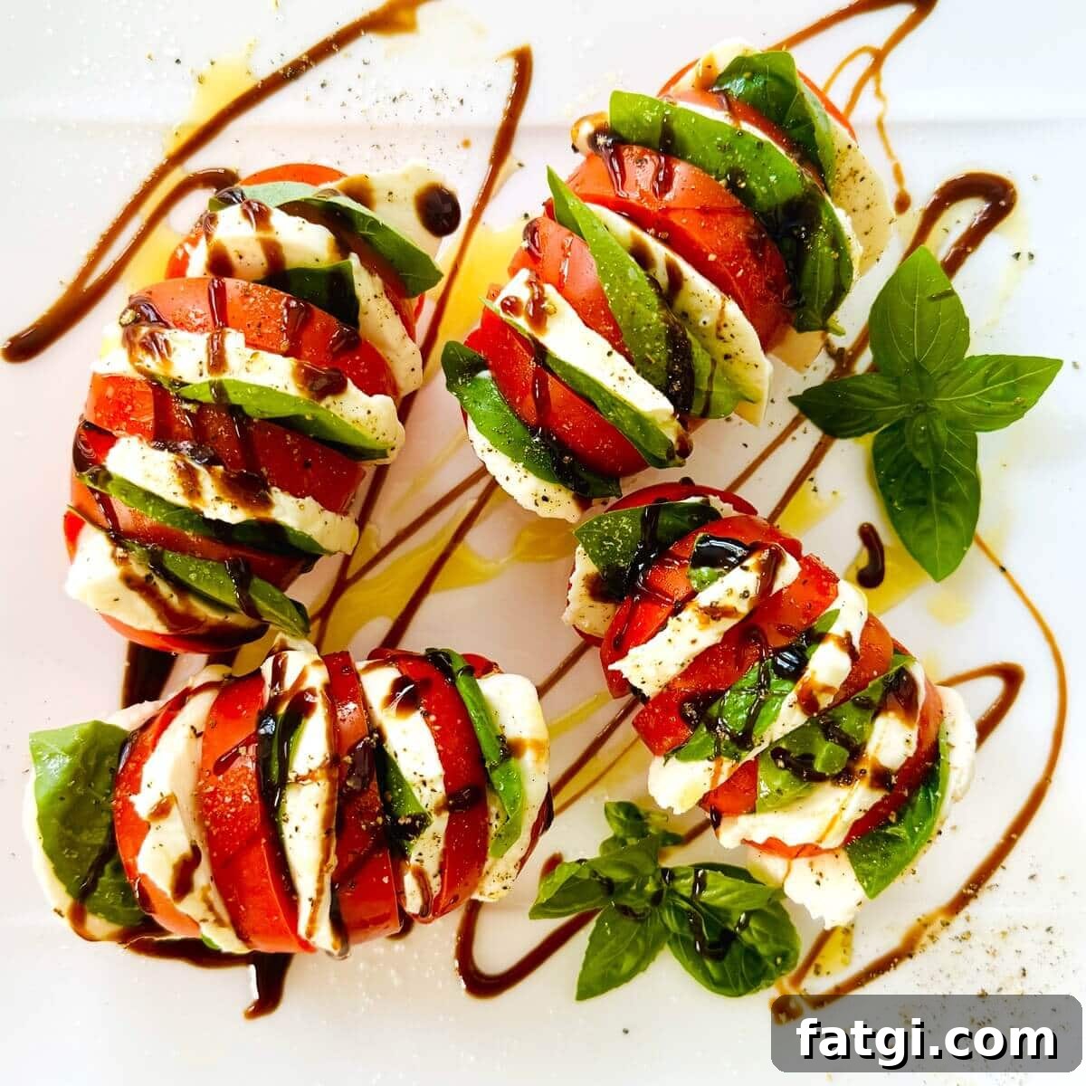 Stuffed Caprese Tomatoes with Mozzarella and Basil 12 4 individual stuffed tomato, mozzarella and basil salads.